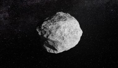 Artist's illustration of an asteroid in deep space.