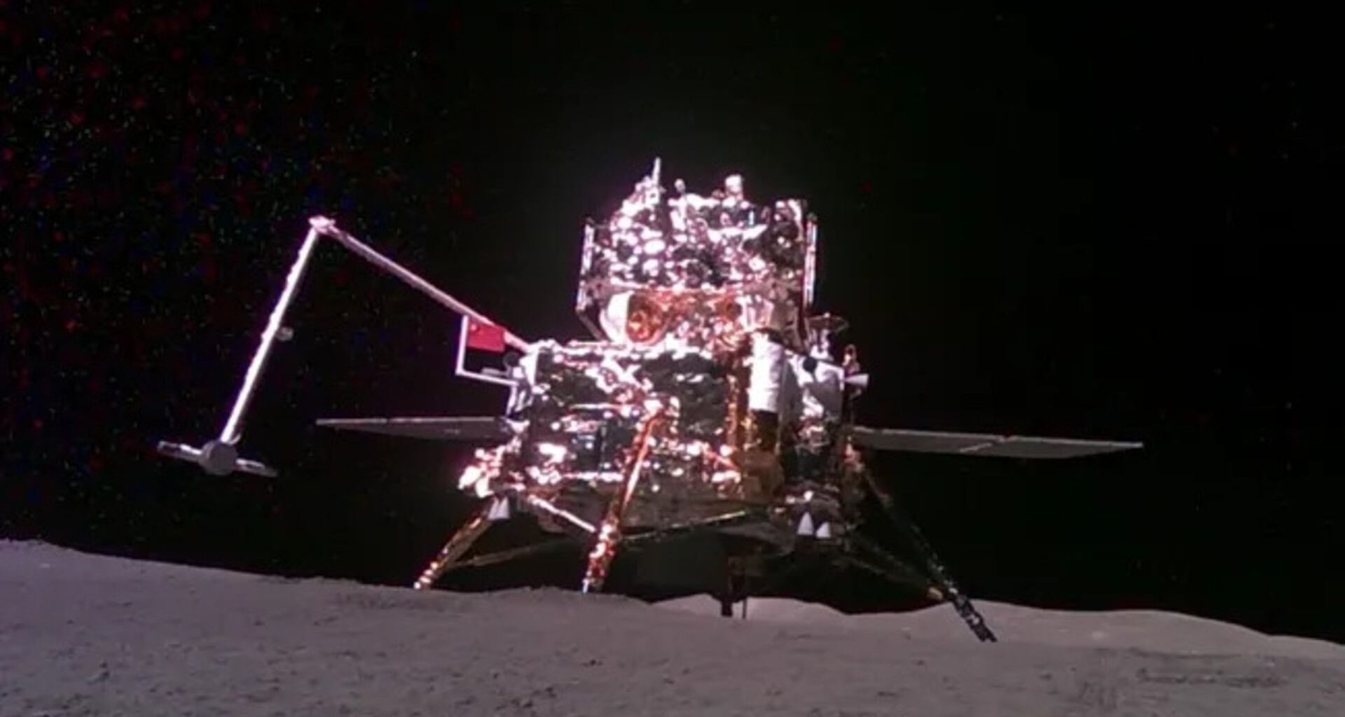 A photo of a lunar lander with a Chinese flag on it