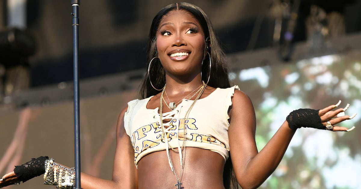 Singer Suffers Anxiety-Inducing Fall Down Slide on Stage