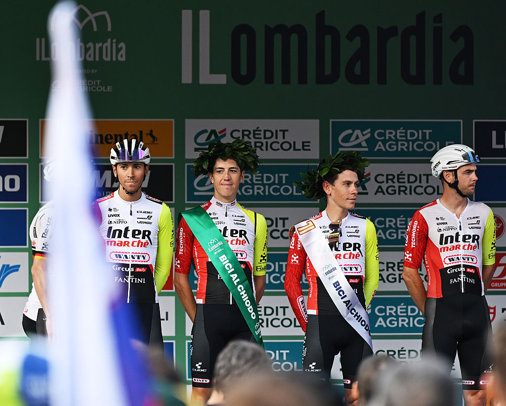 COMO, ITALY - OCTOBER 11: (L-R) Simone Petilli of Italy and Louis Meintjes of South Africa and Team Intermarche - Wanty honored in them farewell and last race as a professional cyclists prior to the 119th Il Lombardia 2025 a 241km one day race from Como to Bergamo on October 11, 2025 in Como, Italy. (Photo by Dario Belingheri/Getty Images)