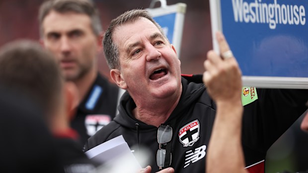 SYDNEY, AUSTRALIA - AUGUST 24:  Saints head coach Ross Lyon speaks to players at three quarter time during the round 24 AFL match between Greater Western Sydney Giants and St Kilda Saints at ENGIE Stadium on August 24, 2025 in Sydney, Australia. (Photo by Matt King/AFL Photos/via Getty Images)