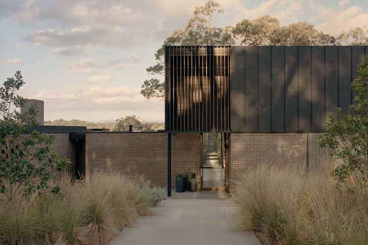 The design’s form and materiality explore a refined expression of agricultural buildings.