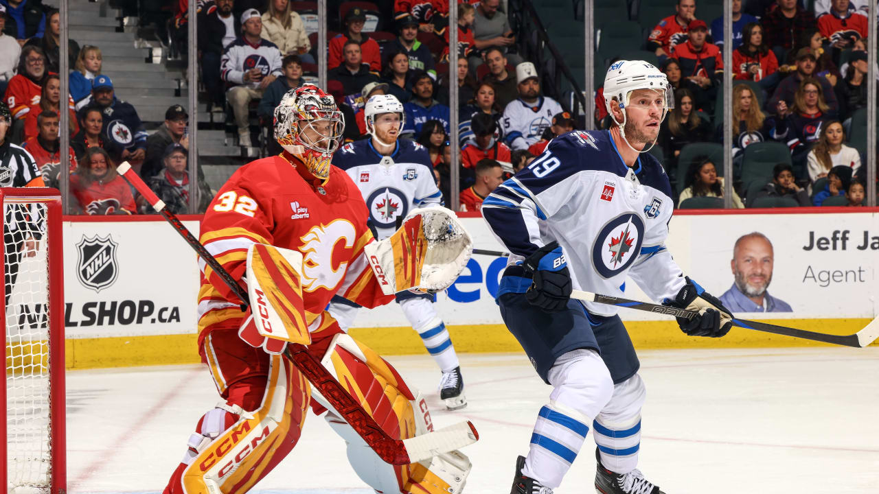 Toews scores 1st goal with hometown Jets in win against Flames