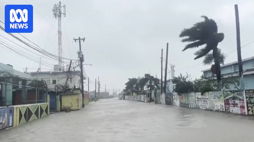 VIDEO: A street in Kingston, Jamaica flooded after Hurricane Melissa made landfall - Australian Broadcasting Corporation