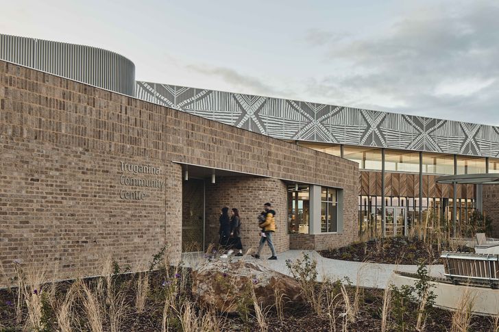 The community centre’s permeable edges and warm, textured materiality is open and welcoming, yielding to thoughtfully planted native landscape designed by Outlines Landscape Architecture.