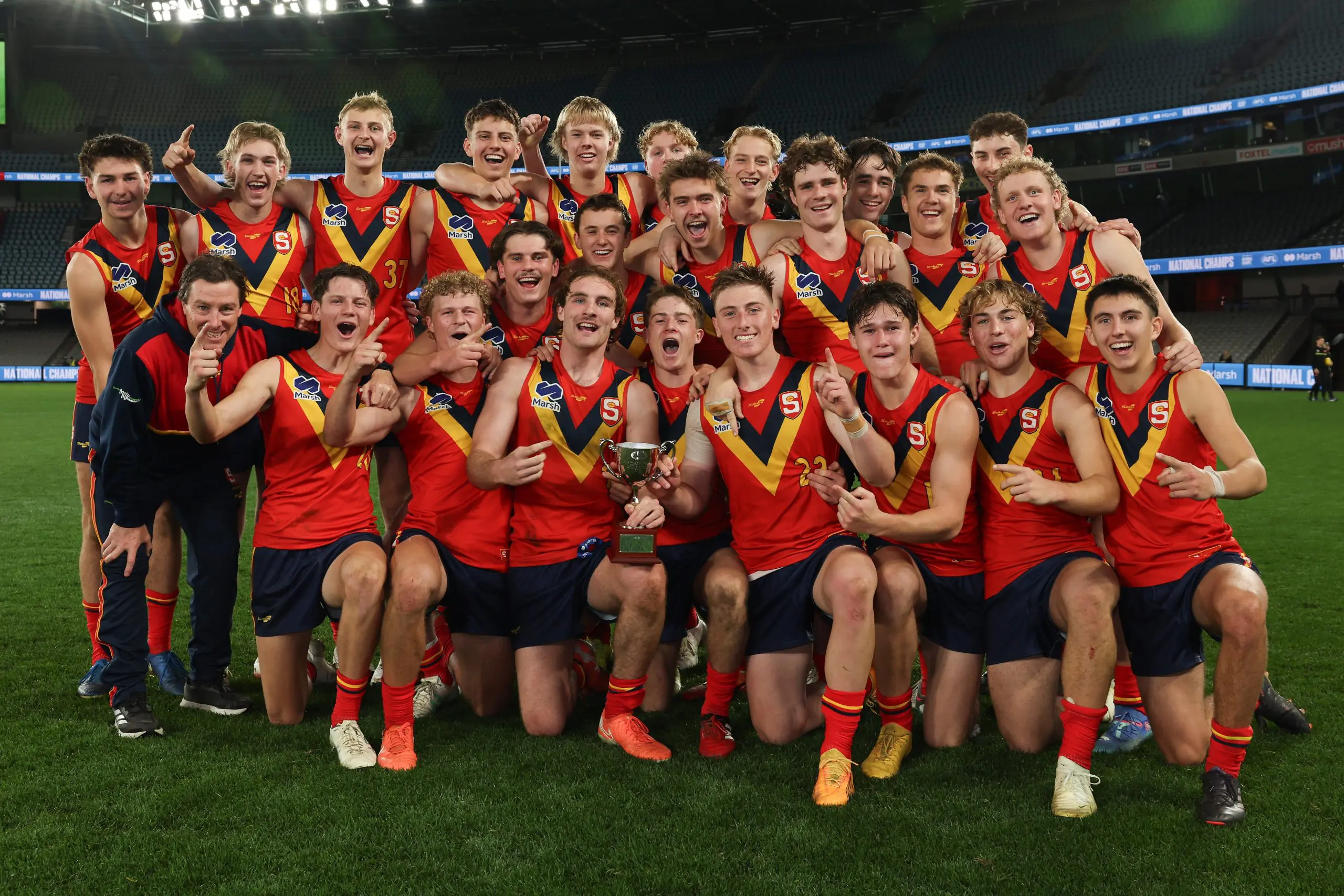 MELBOURNE, AUSTRALIA - JUNE 29: South Australia celebrate after winning the National Championship title following the 2025 Marsh AFL National Championships U18 Boys match between Victoria Country and South Australia at Marvel Stadium on June 29, 2025 in Melbourne, Australia. (Photo by Rob Lawson/AFL Photos)