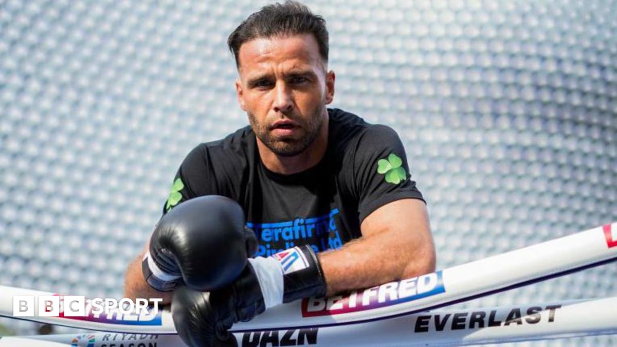 Felix Cash leans over the ropes as he poses for a photo