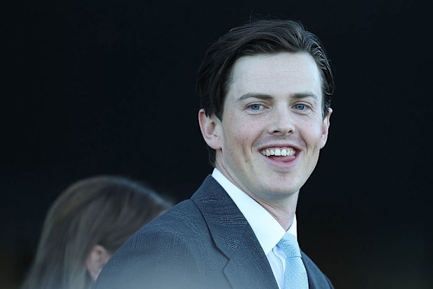 Trainer Tom Charlton looks on at Royal Randwick Racecourse.