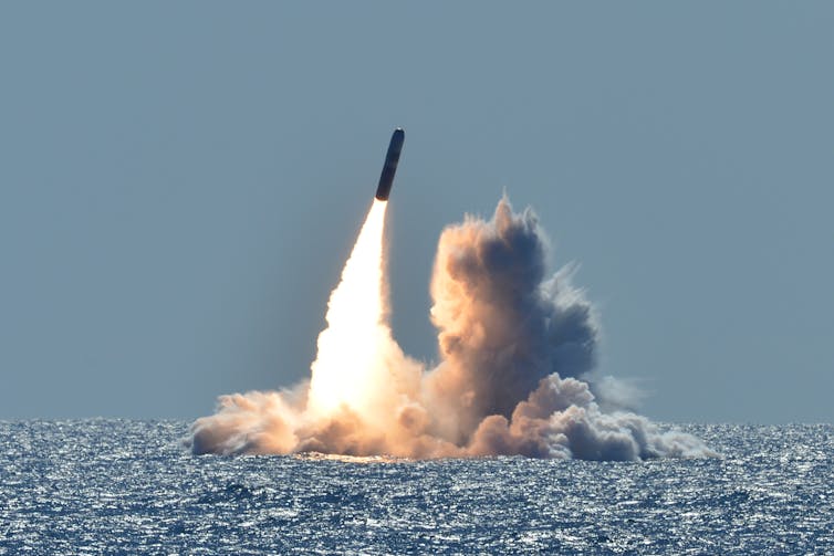 An unarmed Trident II D5 missile launches from the USS Nebraska