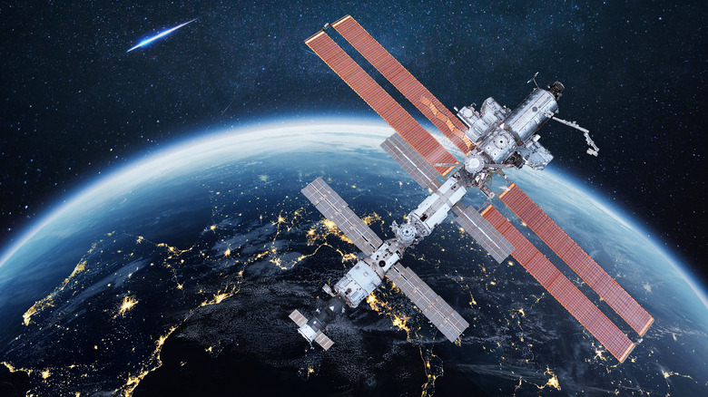 ISS flying with Earth in the background