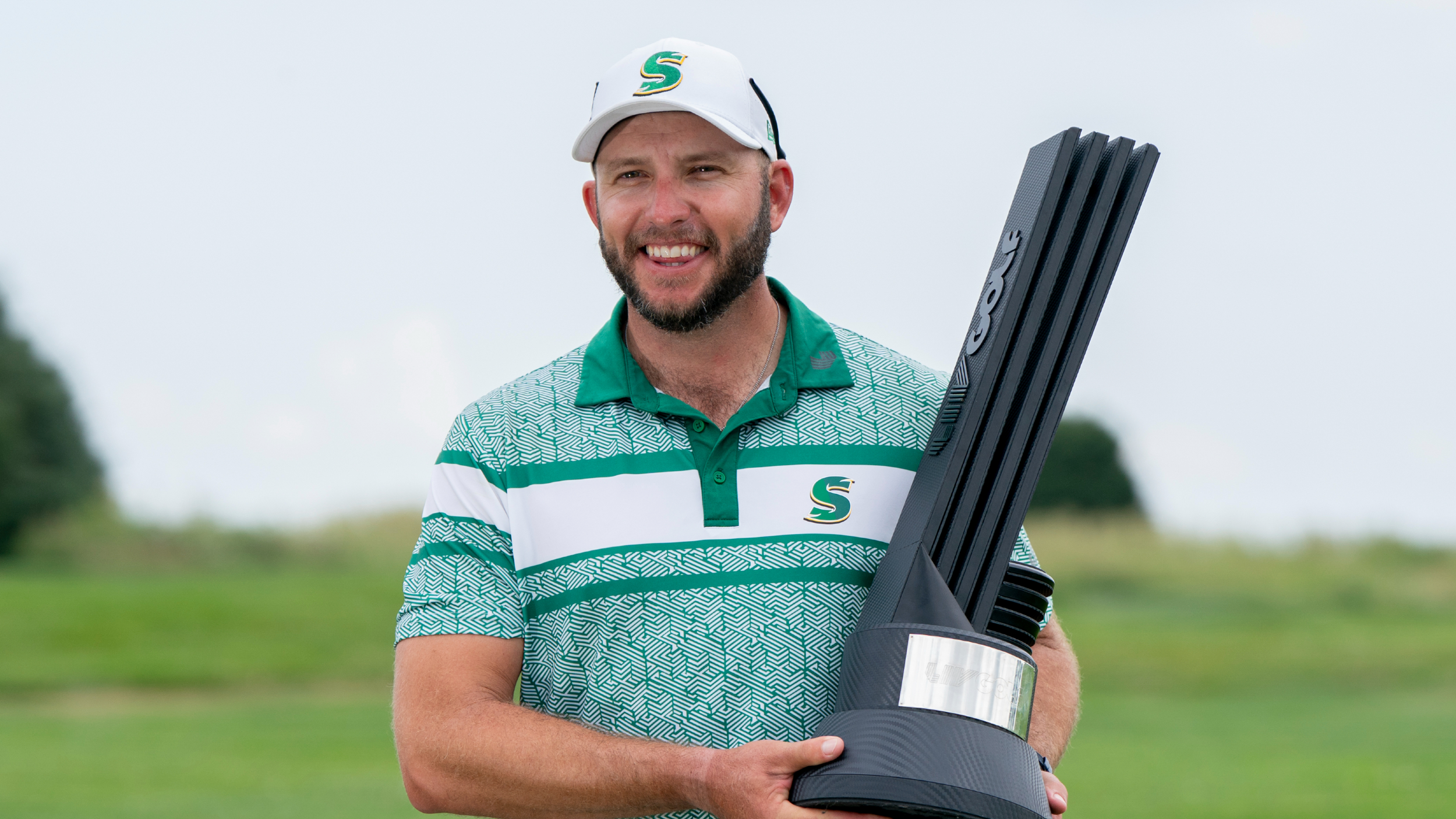 Dean Burmester with the LIV Golf Chicago trophy