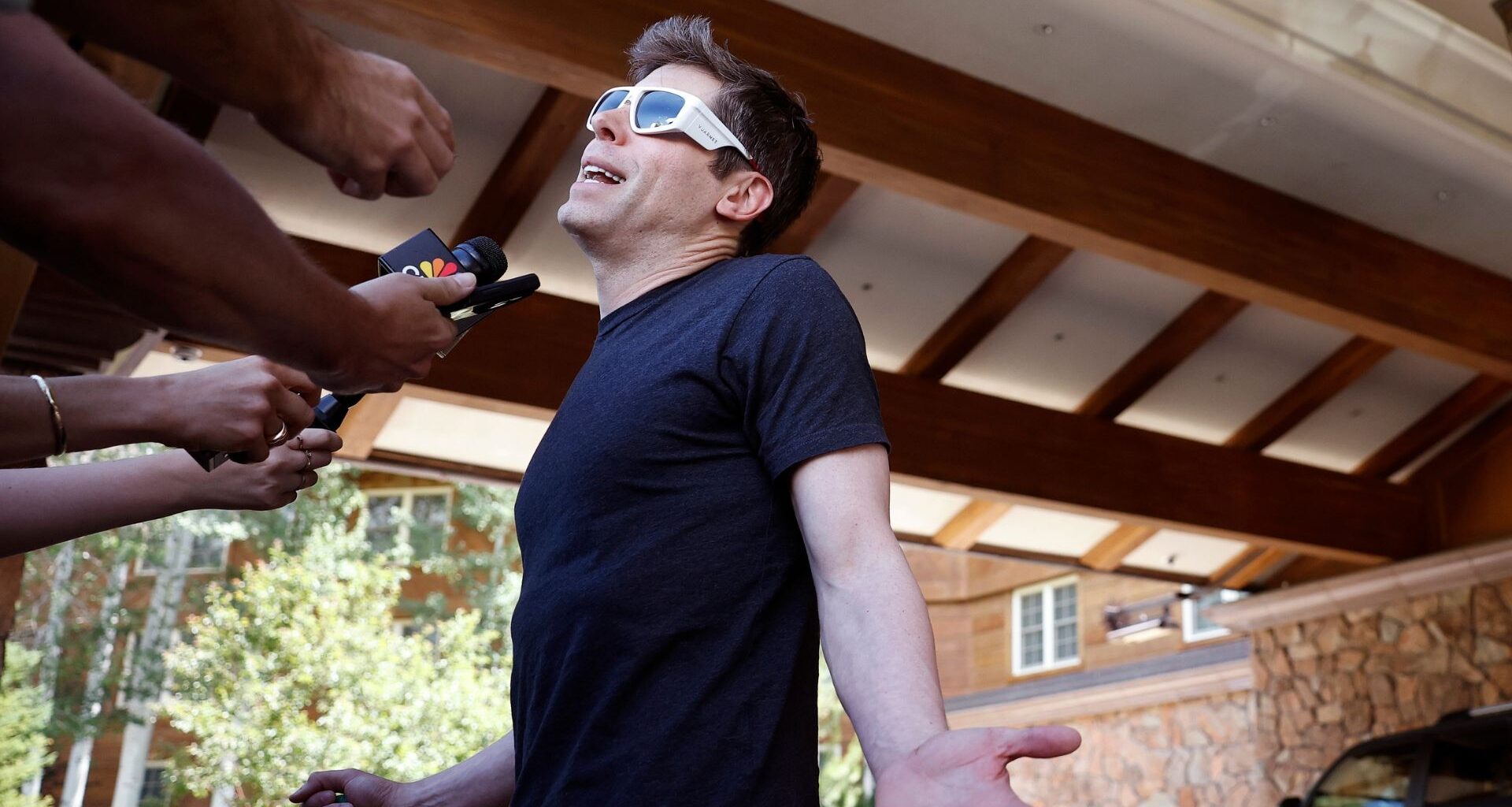 Sam Altman talking with reporters