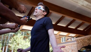 Sam Altman talking with reporters