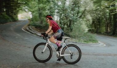 Woman cycles up hill