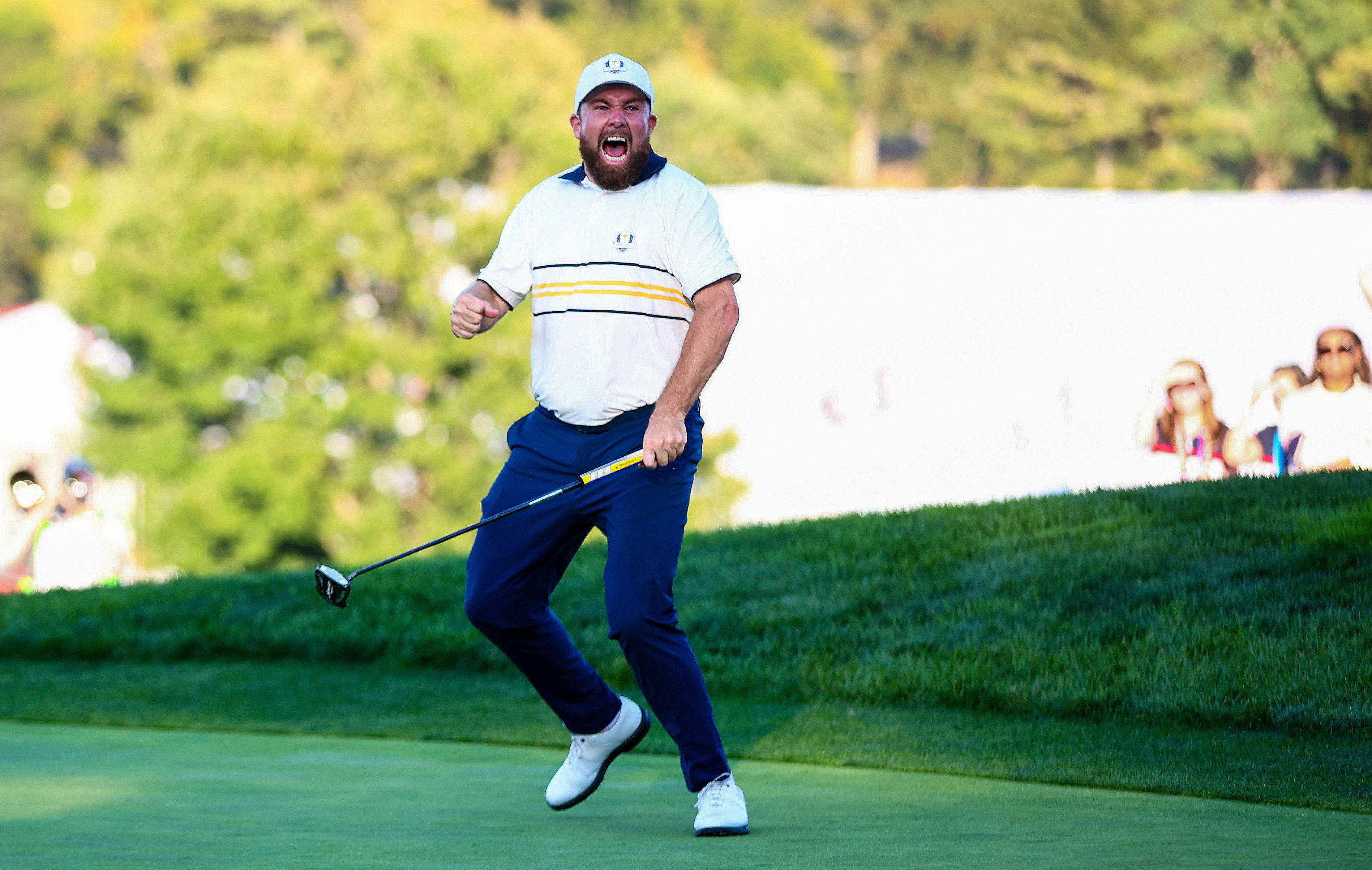 Shane Lowry celebrates following his winning putt