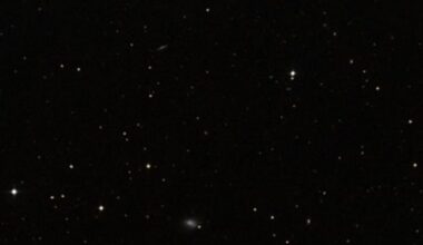 Believe it or not, there's a dwarf galaxy in this image. It's named Segue 1 and it's one of the Milky Way's smallest and dimmest satellite galaxies. Despite its small stature, it's existence is a teachable moment for scientists. Image Credit: SIMBAD, Sloan Digital Sky Survey.