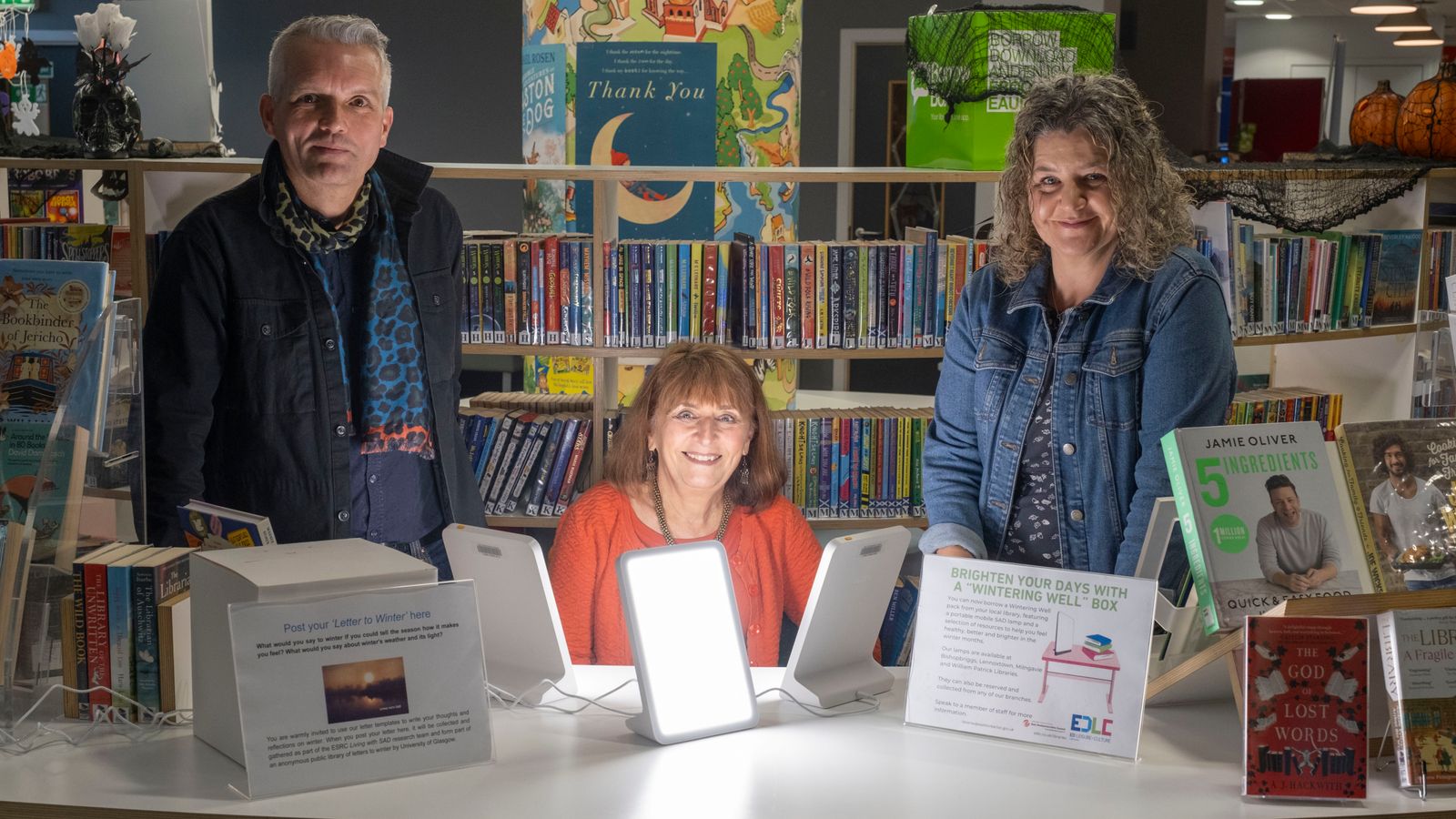 Professor Hayden Lorimer, Wintering Well box user Claire Charlwood, and Professor Hester Parr. Pic: University of Glasgow