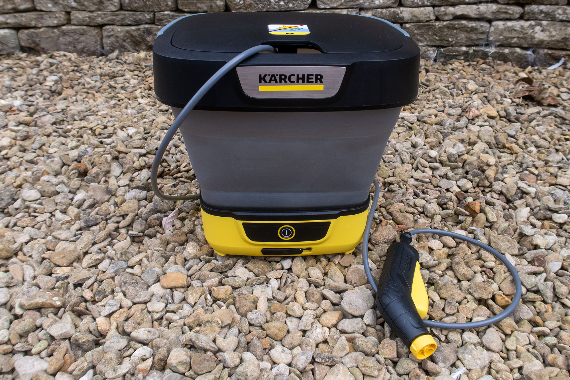 K&auml;rcher Mobile Cleaner OC 3 Foldable pictured on gravel.