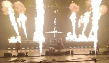 Slayer performing on a stage with lots and lots of fire