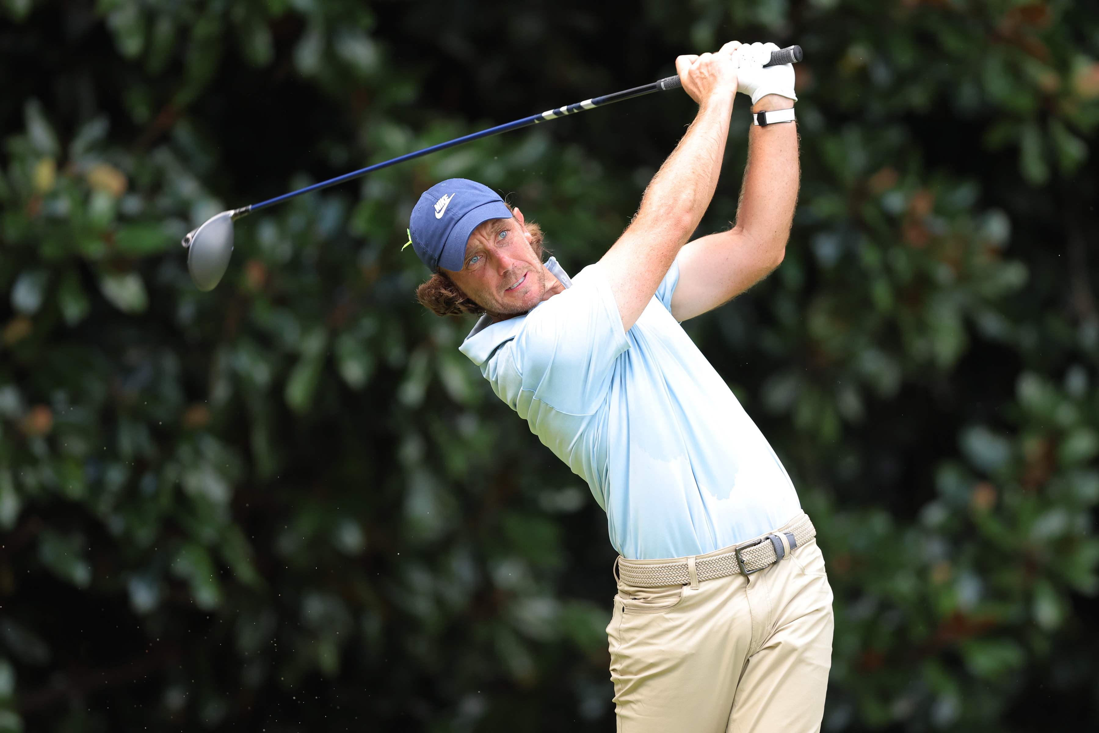 Tommy Fleetwood hits a driver off the tee