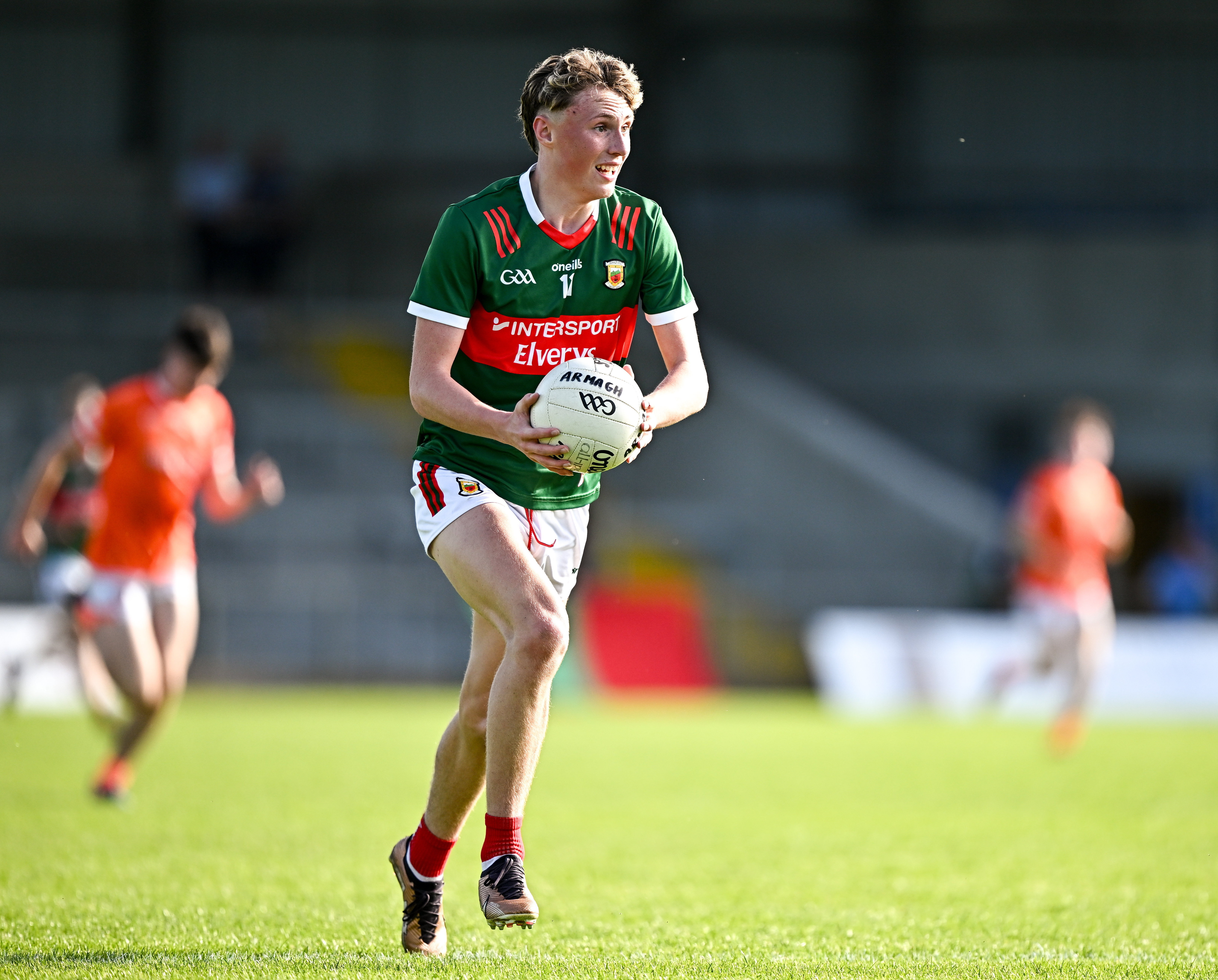 Kobe McDonald of Mayo running with the ball during the Electric Ireland GAA Football All-Ireland Minor Championship semi-final match against Armagh.