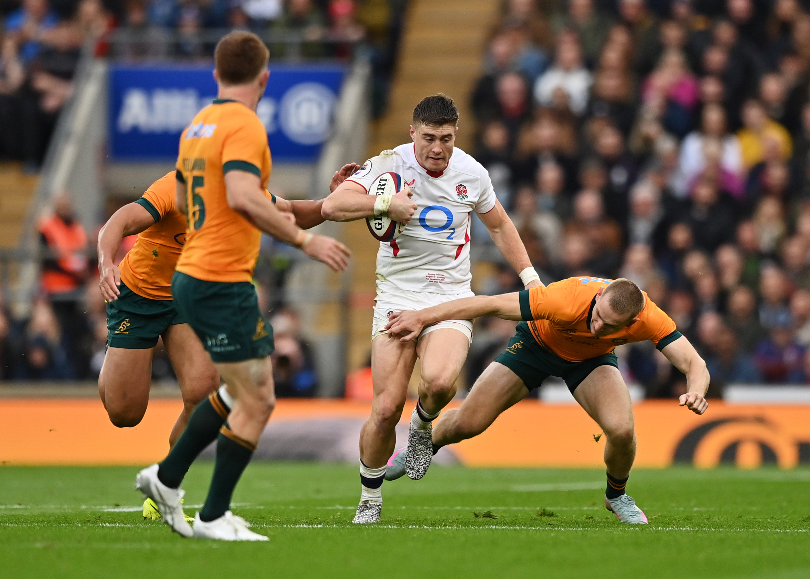 Tommy Freeman of England is challenged by Max Jorgensen of Australia during the Quilter Nations Series 2025 rugby match.