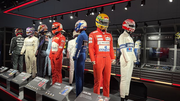 Historical race suits are also on display for F1 fans to see. 
