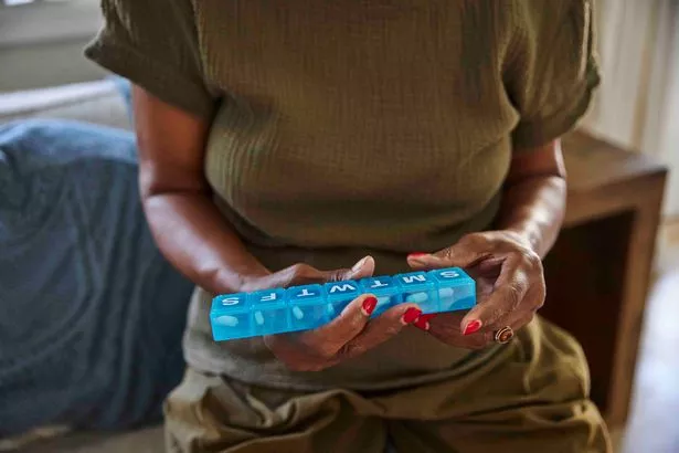 Woman holding tablets