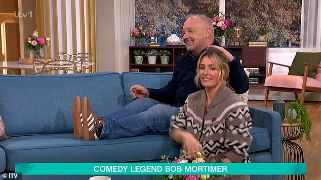 Recreating his writing set-up at home for the viewers, Bob invited Cat to play his pet cat, as he acted out penning a novel