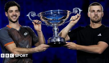 Julian Cash and Lloyd Glasspool lift the trophy for finishing as the leading ATP Tour doubles pair in 2025