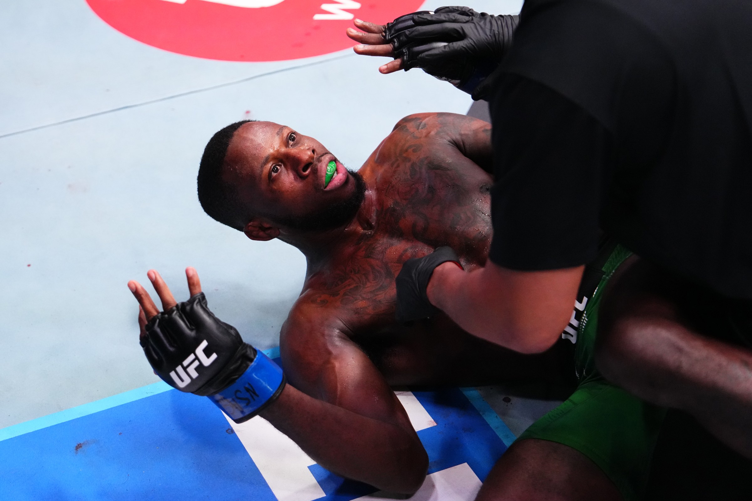 LAS VEGAS, NEVADA - NOVEMBER 08: Randy Brown of Jamaica protests after the stoppage of his welterweight fight against Gabriel Bonfim of Brazil during the UFC Fight Night event at UFC APEX on November 08, 2025 in Las Vegas, Nevada. (Photo by Jeff Bottari/Zuffa LLC)