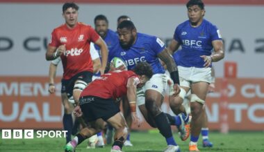 Samoa and Belgium players battle for the ball in Dubai