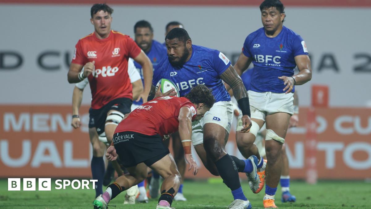 Samoa and Belgium players battle for the ball in Dubai