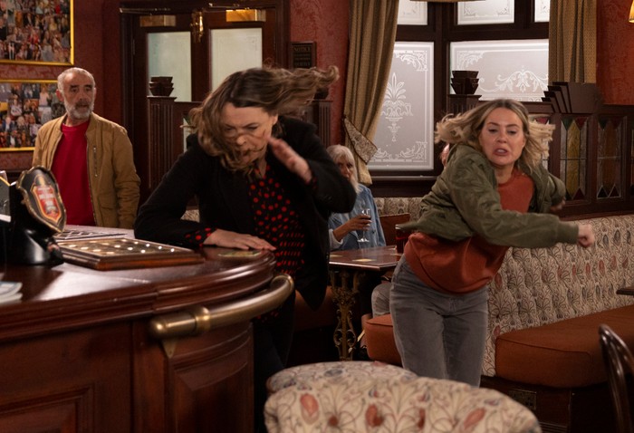Abi slaps Tracy in Coronation Street as a horrified Kevin watches on