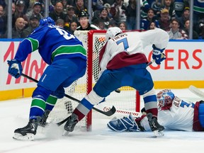 Linus Karlsson scores a goal on Mackenzie Blackwood of the Colorado Avalanche during the first period at Rogers Arena on November 9, 2025.