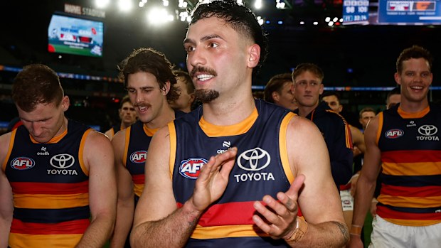 MELBOURNE, AUSTRALIA - JULY 12: Izak Rankine of the Crows celebrates after his 100th match during the 2025 AFL Round 18 match between the Western Bulldogs and the Adelaide Crows at Marvel Stadium on July 12, 2025 in Melbourne, Australia. (Photo by Michael Willson/AFL Photos via Getty Images)