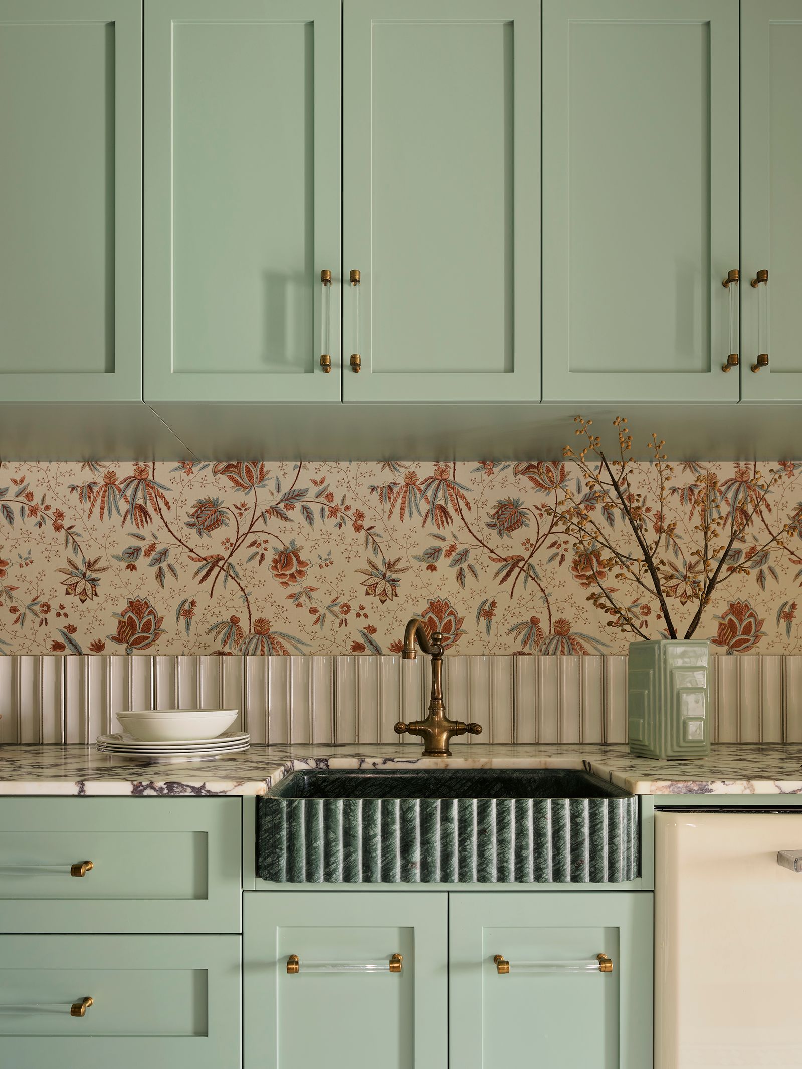 Image may contain Indoors Interior Design Sink Sink Faucet Kitchen Home Decor and Furniture