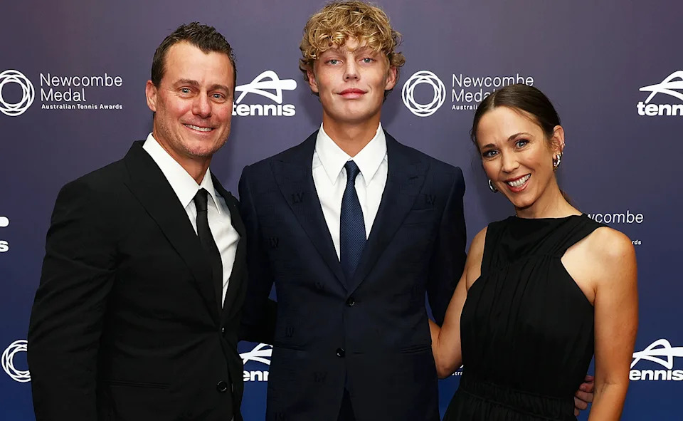 Lleyton Hewitt, pictured here with son Cruz and wife Bec in 2024. 