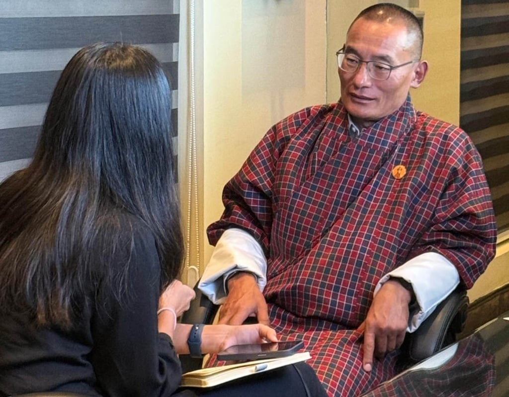 Bhutanese Prime Minister Tshering Tobgay speaks to This Week in Asia reporter Jean Iau. Photo: Instagram/nor.mandala