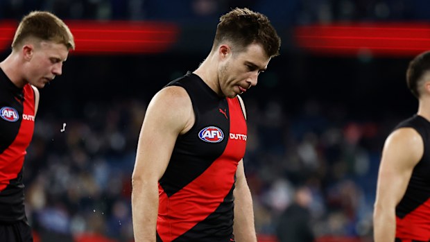 Zach Merrett of the Bombers looks dejected after a loss.