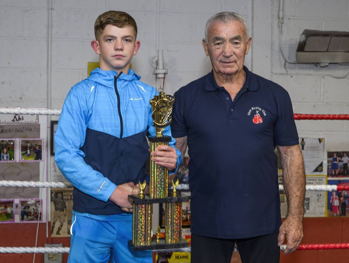 Cork Boxing: Glen BC head coach presenting the Best Boxer trophy named in his honour to Michael O’Reilly from Togher BC. Picture: Doug Minihane