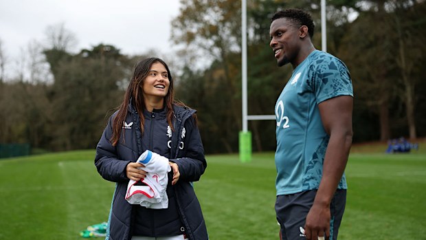 British tennis player Emma Raducanu talks with Maro Itoje of England.