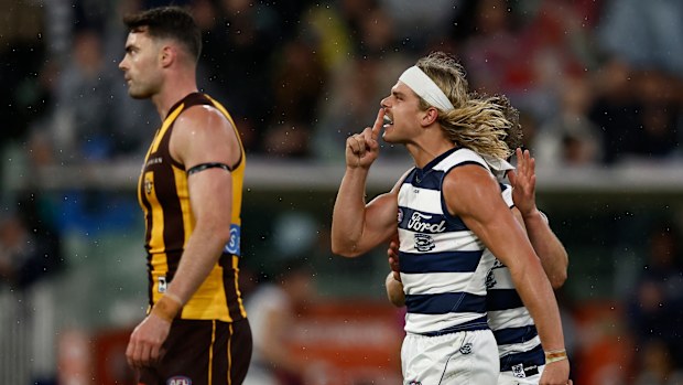 Bailey Smith of the Cats celebrates a goal.