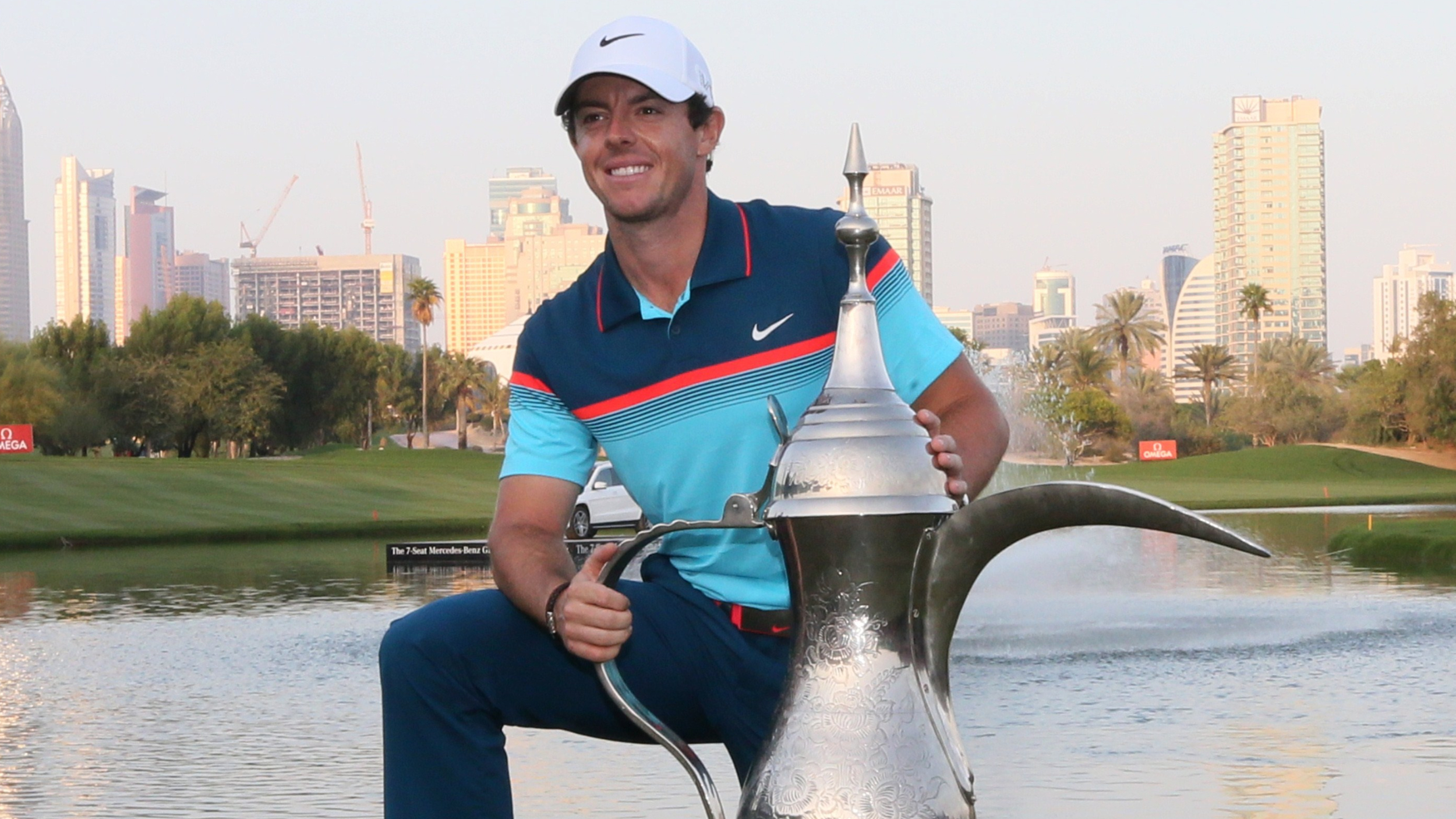 Rory McIlroy with the Dubai Desert Classic trophy