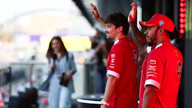 Charles Leclerc of Monaco and Lewis Hamilton of Great Britain and Scuderia Ferrari on the drivers parade.