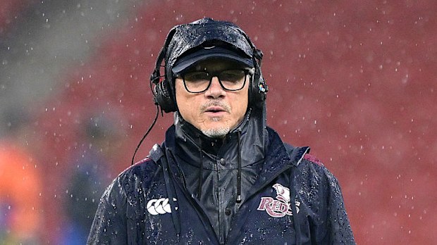 Coach Les Kiss of the Reds is seen during the warm up.