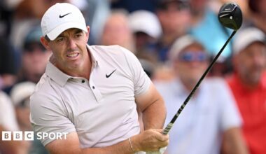 Rory McIlroy watches one of his shots