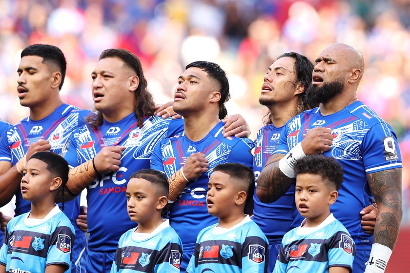 Toa Samoa players sing the anthem.