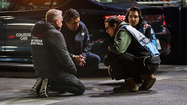 Track officials worked through the night to have the track ready for qualifying. 