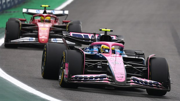 Franco Colapinto of Argentina leads Lewis Hamilton of Great Britain.